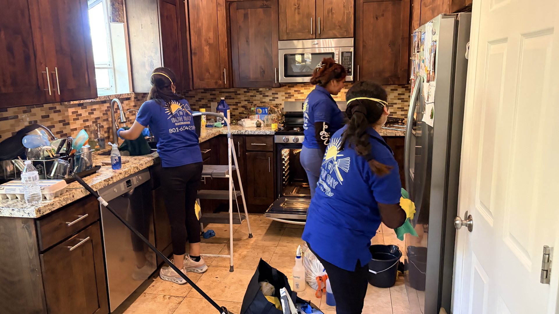 Sun Ray team cleaning a kitchen in a Summit County home
