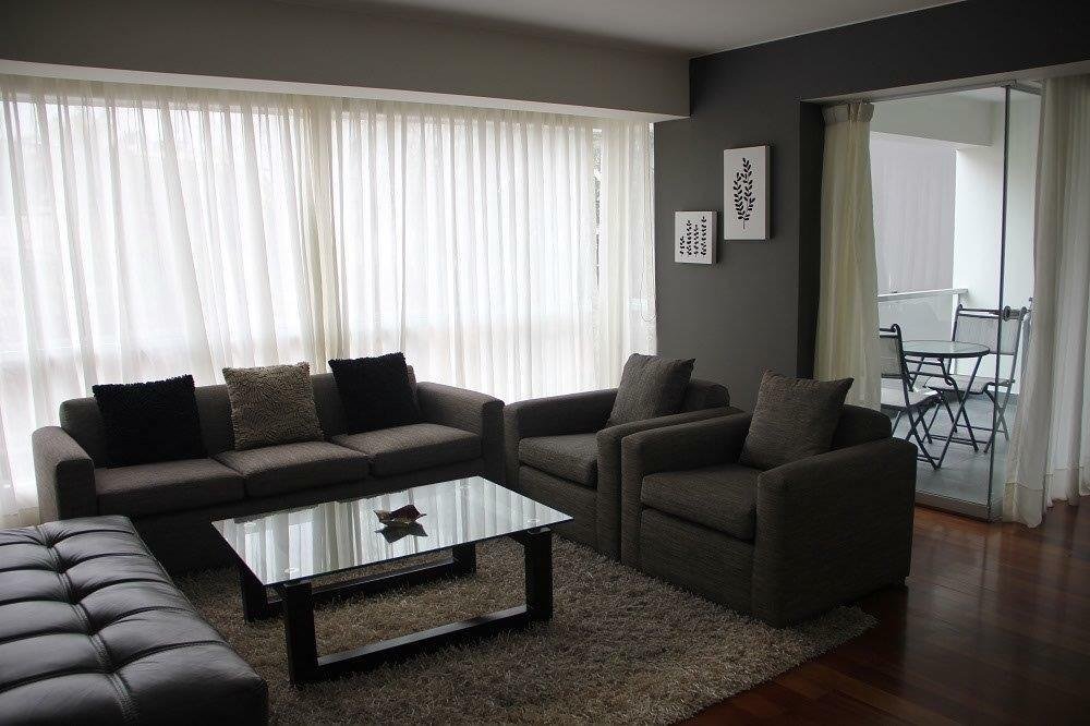 Bright living room cleaned and staged by Sun Ray Cleaning Services